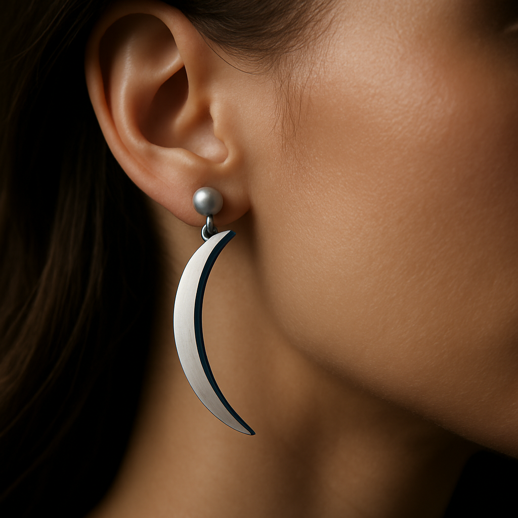 Lunar Arc Earrings — worn by a woman